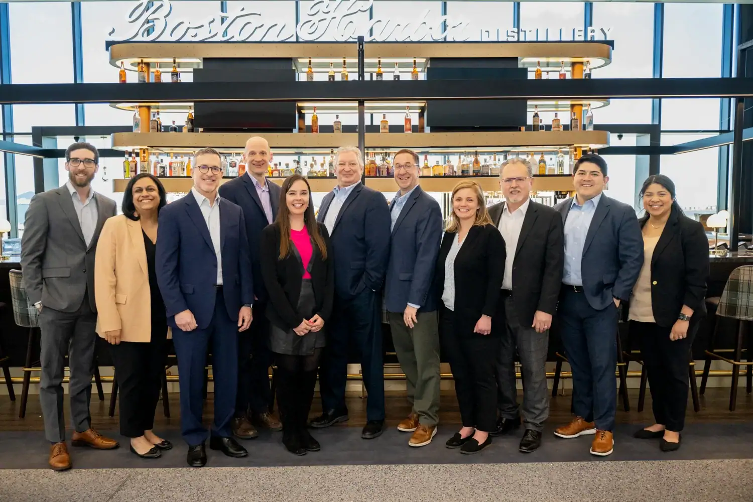 MarketPlace Leadership Group Photo in front of Boston Harbor Distillery at Boston Logan International Airport